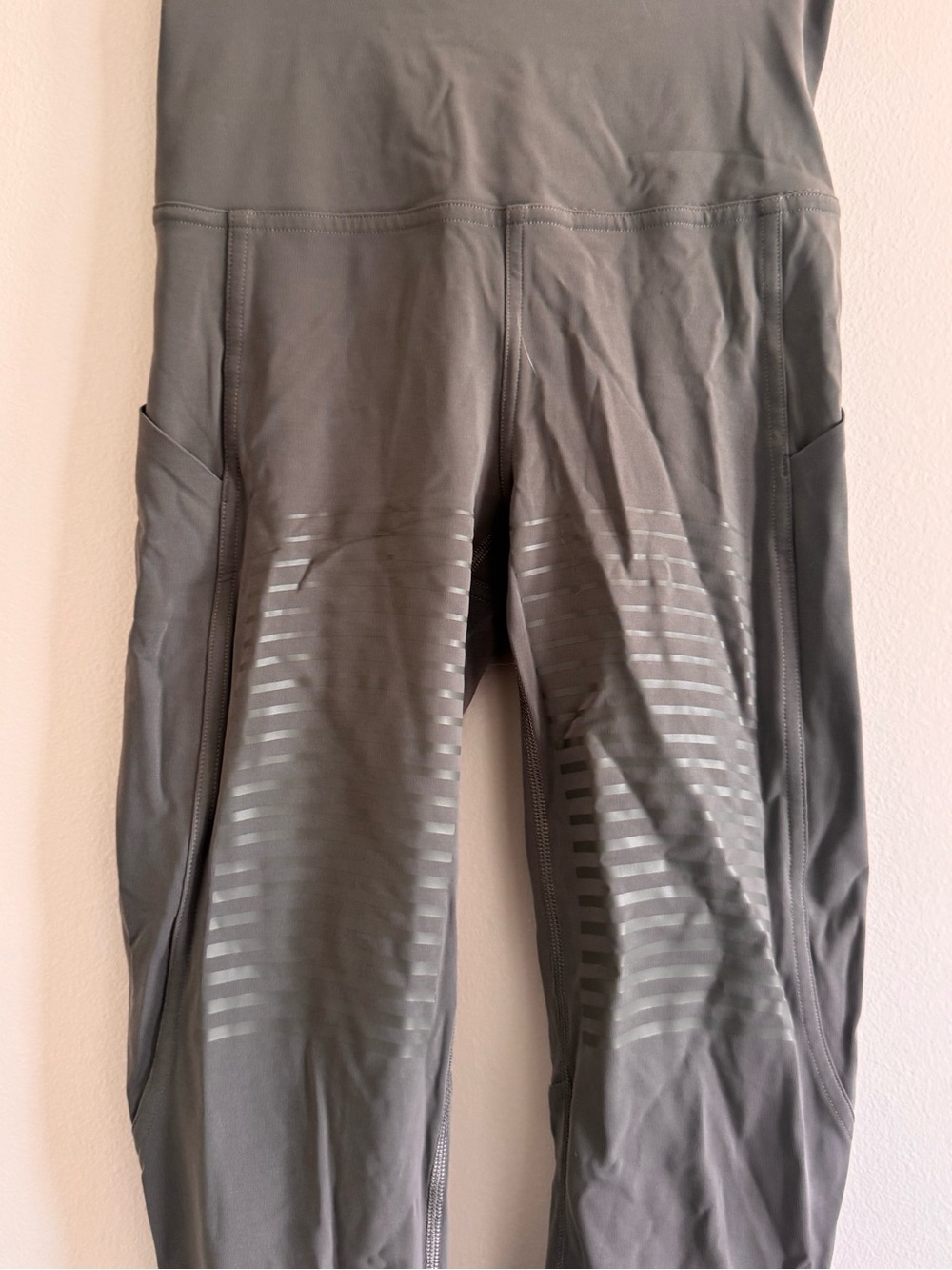 Lululemon High-Waist Olive Green reflective Athletic Leggings with Side Pockets